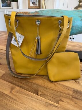 NWT Reversible Silver and Yellow Tote Bag with Tassel Charm